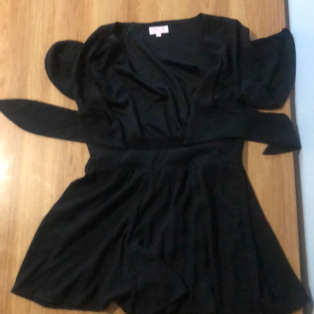 Pink lily romper it ties in the front